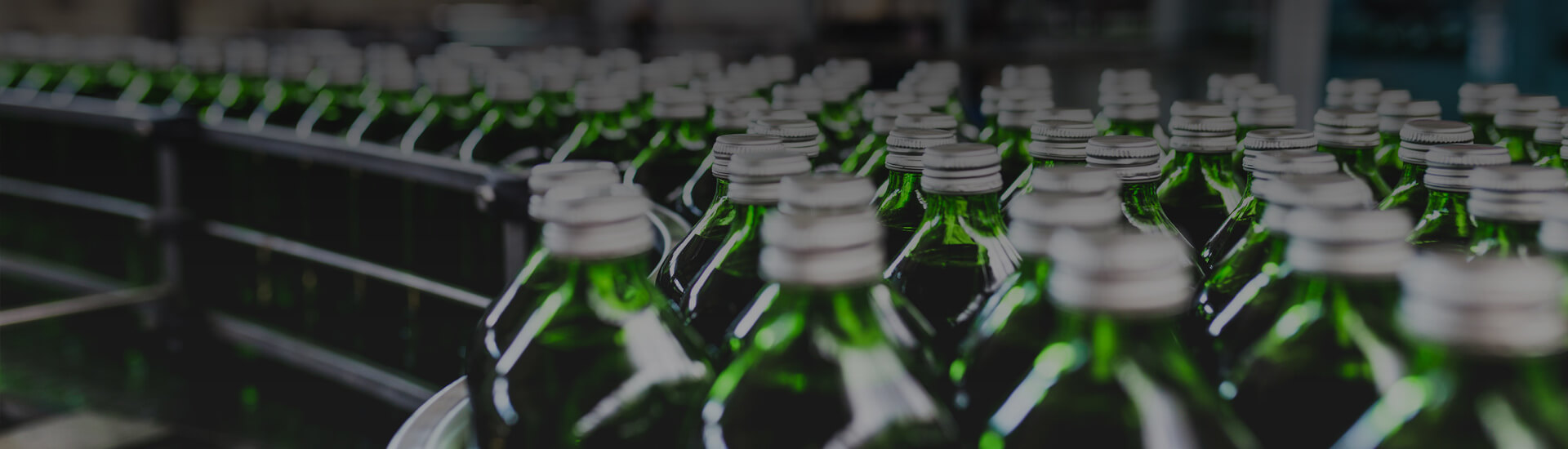 Photo of green bottles during manufacturing